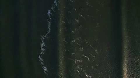 Abstract top down ocean waves in sunset Stock Footage 224107915