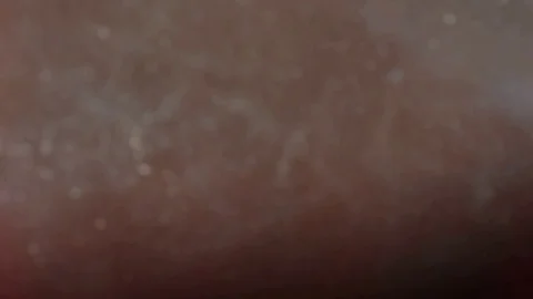 Abstract top view on surface of coffee with rising steam particles. Close up Stock Footage 74893911