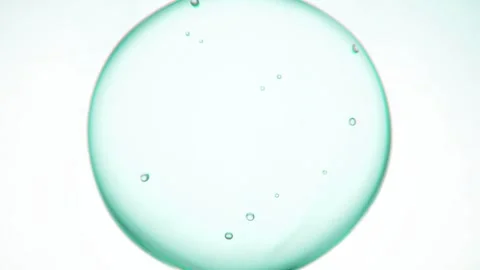 Abstract Translucent Molecule With Floating Bubbles on Clean White Background Stock Footage 341522826