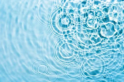Abstract transparent liquid background with concentric circles and ripples. Spa Stock Photos