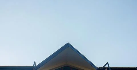 Abstract triangle on blue sky background Stock Photos
