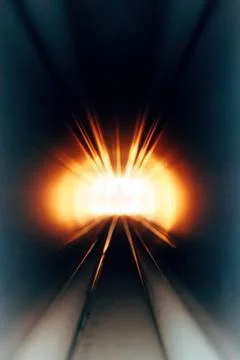 Abstract tunnel of bright light rays bursting forward motion effect Stock Photos