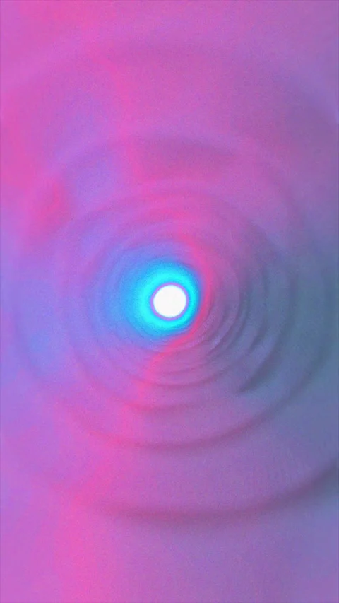Abstract tunnel of light glows with dynamic pink and blue rings Video stock 332411690