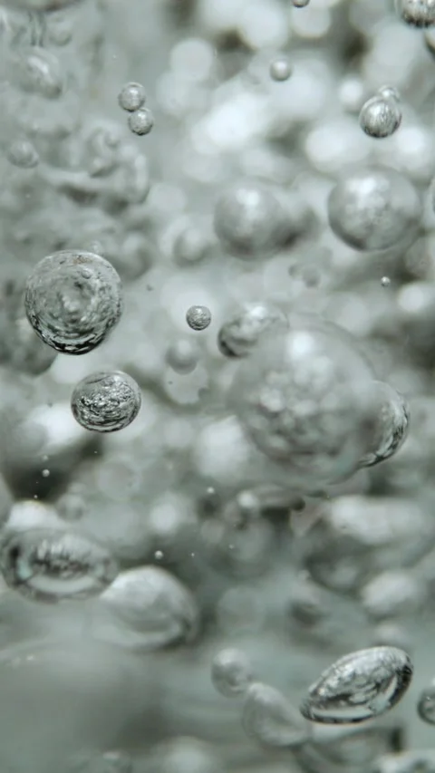 Abstract underwater background with rising bubbles in sparkling liquid wate.. Stock Footage 337441047