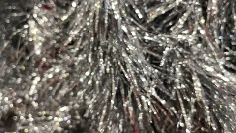 Abstract, unfocused festive background. Silver sequins. Video stock 220712021