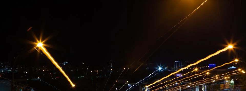 Abstract urban background with yellow light tracks. New technology concept. Stock Photos