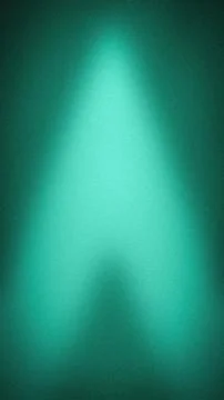 Abstract vertical background featuring a grainy teal and turquoise light be.. Stock Photos