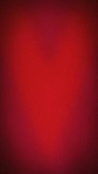 Abstract vertical background with a vibrant red and deep burgundy grainy te.. Stock Photos