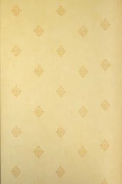 Abstract vertical beige floral pattern on a light yellow wall - fabric, texture Stock Photos