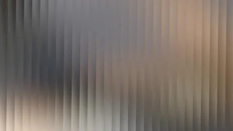Abstract vertical blinds pattern with gradient shades of beige and gray Stock Footage 335430213
