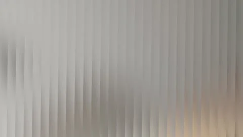 Abstract vertical blinds with soft light and shadow creating a subtle strip.. Stock Footage 335430212