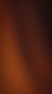 Abstract vertical brown orange gradient background with grainy texture and .. Stock Photos
