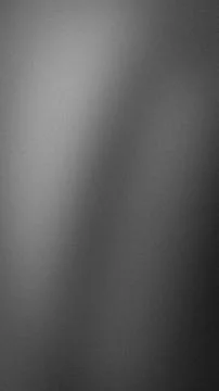 Abstract vertical grainy gray black white texture background blur gradient .. Stock Photos