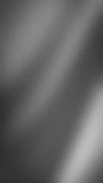 Abstract vertical grayscale gradient background with grainy textured blur p.. Stock Photos