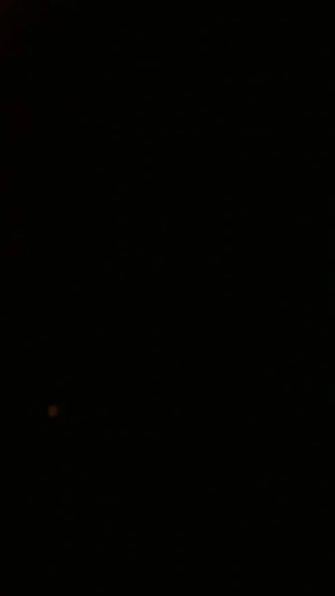 Abstract vertical light transition effect with glowing white streaks on a dark Video stock 347485150