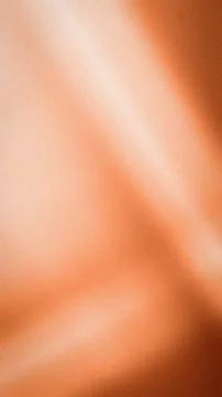 Abstract vertical peach orange and cream grainy gradient background with so.. Stock Illustration