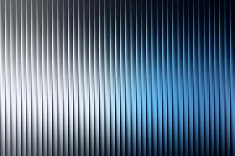 Abstract vertical ribbed pattern with a gradient from silver to blue illust.. Illustrazione stock