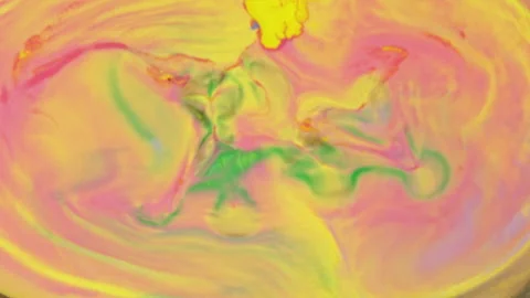 Abstract vibrant fluid motion with pink yellow and green paint swirls 스톡 동영상 331663611
