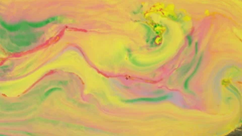 Abstract vibrant fluid motion with pink yellow and green paint swirls 스톡 동영상 331664370