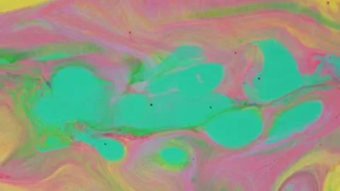 Abstract vibrant fluid motion with pink yellow and green paint swirls Stock-Footage 331665052