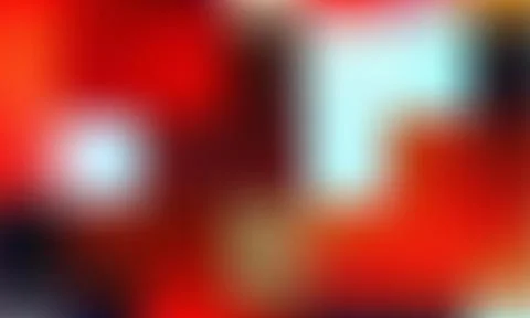 Abstract vibrant grainy gradient background with blurred red, cyan, and dar.. 스톡 일러스트