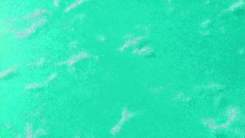Abstract Vibrant Teal Mint Green Textured Background with Subtle White Noise Stock Footage 341477718