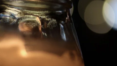 Abstract video with a candle blur and bokeh. Stock Footage 98383353