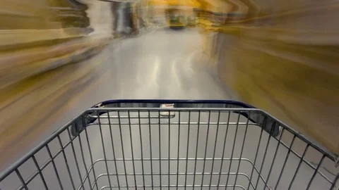 Abstract video of empty cart moving in the building supermarket. Time lapse. Stock Footage 80169004
