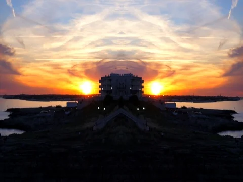 Abstract video with mirror effect. Beautiful sunset in Polignano a Mare, Italy 動画素材 71204121