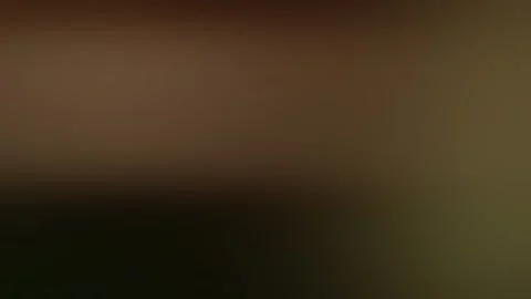 Abstract video presentation background featuring blurred moving lights, warm  Stock Footage 293367648