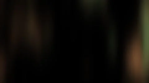 Abstract video presentation background featuring blurred moving lights, warm  Stock Footage 293368043