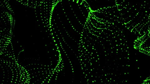 An abstract video showcasing green dotted waveforms in a 3D pattern against a Video stock 276877918