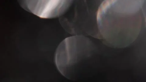 Abstract video of subtle bokeh with black and white lights 库存影片 318921988