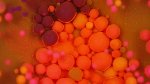 Abstract video of the view of multi-colored bubbles in a microscope Stock Footage 278315416