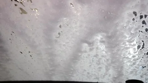 Abstract view of car wash automatic line, focus only on drops of water, jet s Video stock 246624455