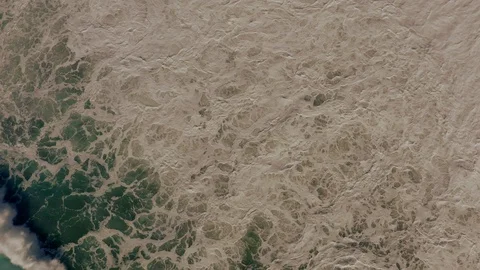 Abstract view of rough windy Pacific Ocean with swirling waters and crashing Stock Footage 131339200