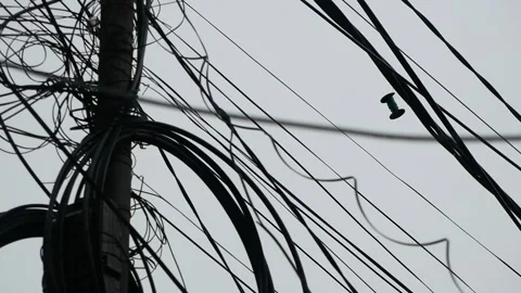 An abstract view of tangled electrical wires criss-crossing. Stock Footage 251610107