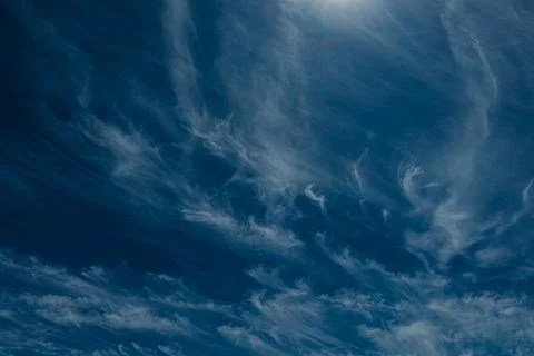 An abstract view of thin, faint clouds drifting across. Stock Photos