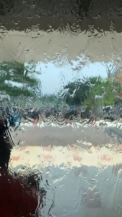 Abstract View Through Rain-Drenched Glass Video stock 287995548