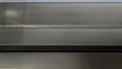Abstract view of track barriers from a bullet train “Shinkansen” window. Stock Footage 159577633