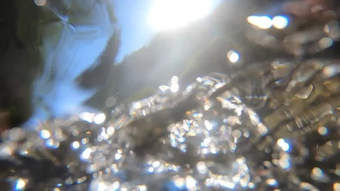Abstract view of the water surface of a strong current stream of the river Stock Footage 141513863