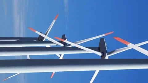 Abstract view of wind farm with rotating turbines in horizontal frame Stock Footage 318926159