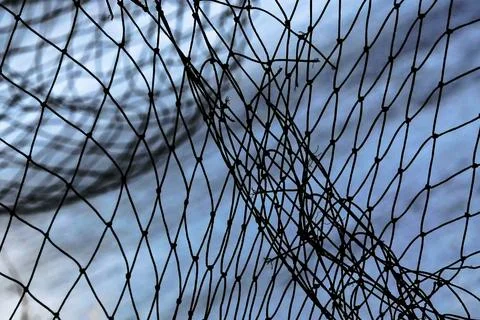 Abstract views of protective nets against birds on fish ponds Stock Photos