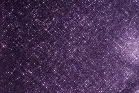 Abstract violet background with sparkles in the shape of stars. Stock Photos