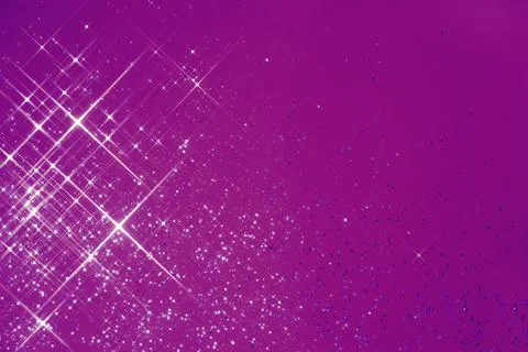 Abstract violet background with sparkles in the shape of stars. Stock Photos
