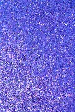 Abstract violet bright background with multicolored sparkles Stock Photos