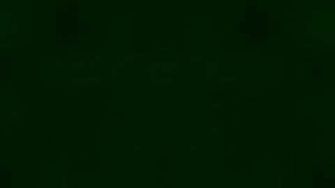 Abstract Visual Waves Moving Across a Dark Green Field Stock Footage 337888308