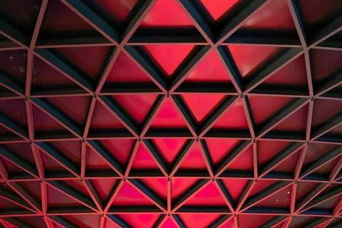 Abstract vortex architectural pattern of red triangles structure Stock Photos