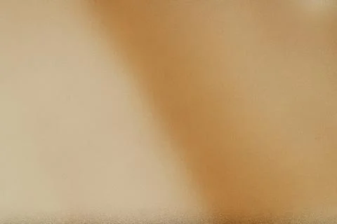 Abstract warm beige gradient background with grain texture Stock Photos