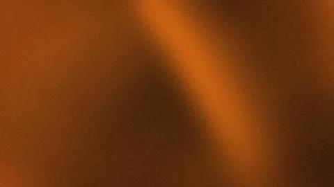 Abstract warm brown orange gradient grainy blur background wallpaper textur.. Stock Photos